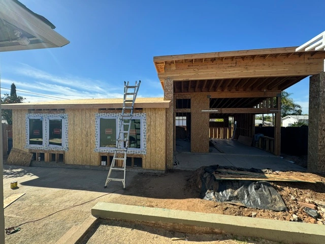 Home addition under construction and completed